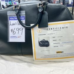 Louis Vuitton Kendall leather travel bag .