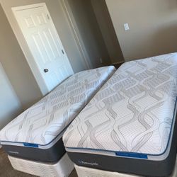 2 TWIN XL SEALY POSTUREPEDIC MATTRESSES AND FREE BOX SPRINGS