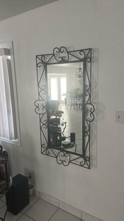 Heavy wrought iron mirror