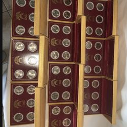 United States Monetary Exchange All 50 states quarters set in gold boxes