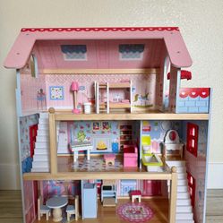 New "Kidkraft" wooden dollhouse 
