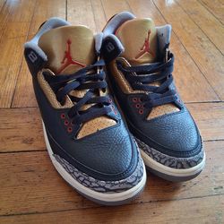 Black cement gold 3's