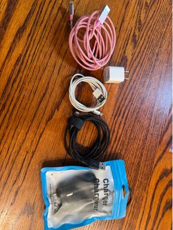 Three iPhone charging cables with plug block and car charger