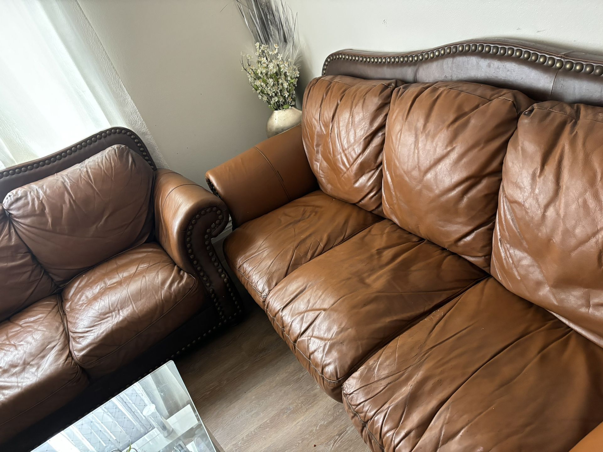 Brown leather couches