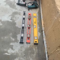 Construction tools level drywall, screw, staples, two buckets up with a carrier