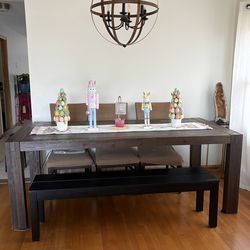 Dining room table w/bench and 3 chairs seats 6 .