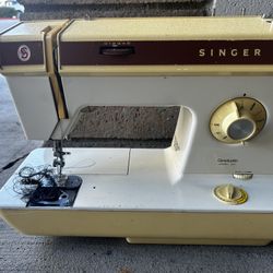 Singer Sewing Machine And Fabric 