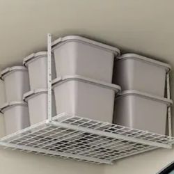 2 ( New In The Box) Overhead garage storage ( Tupperware is not included )