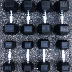 SET OF RUBBER DUMBBELLS  (PAIRS OF)  :  15s  20s  30s  35s   