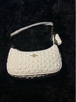 white coach bag