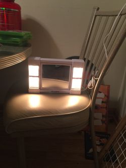 Plug in lighted vanity or makeup mirror works great south philly