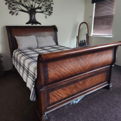Wooden Armoire and Queen Sled Bed