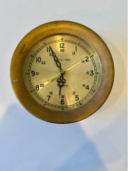 Nautilus Quartz Clock brass filigree style hands Arabic numerals 7”