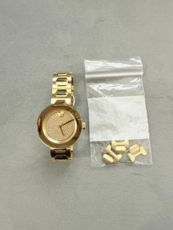 beautiful movado women watch with extra links. (MUST SELL TODAY)