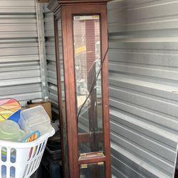 Curio Cabinet . Very Nice , Glass Shelves And Lights Up 