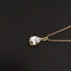 Cubic Zirconia pendant on gold plate chain marked 1/20 14k N/C