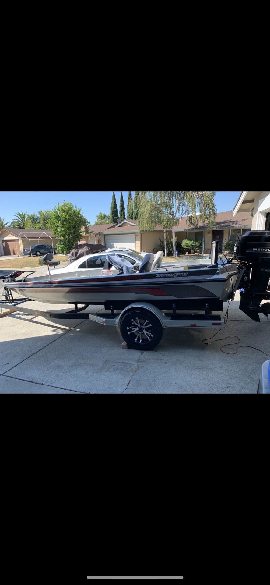 1986 18ft Ranger bass boat (rehauled) new carpet,custom built front deck (more walking space) super clean! w/trailer all registration up to date