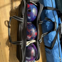 3 Bowling Balls And A Roll Bag .