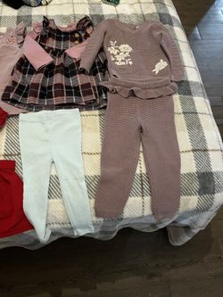 12-month-old baby clothes; only one outfit is size 18 months.