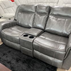 Gorgeous Reclining Loveseat With Center Console And Stainless Steel Cupholders