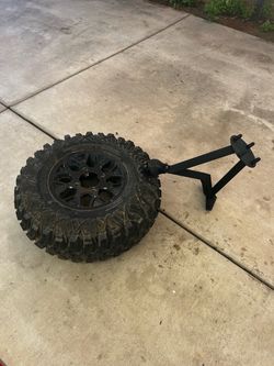 Can an x3 spare tire carrier and spare tire