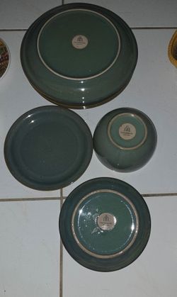 Vintage green stoneware dinner set, four 11" plates, two 8" plates, one bowl