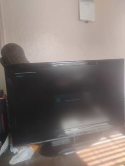 Samsung 50-inch flat screen TV with remote control