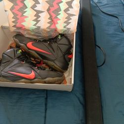 Black Sleek Soundbar Bluetooth Compatible And Pair Of Mens LeBron James Shoes Size 12