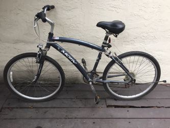 18 Motiv Newport FS Mountain Bike Needs tires pumped up or new tubes. Has been in my storage for years. Some light surface wear but still ride for