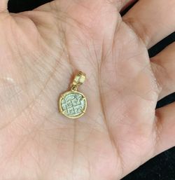Baby atocha silver coin pendant in gold bezel