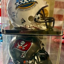 NFL Mini Helmet Display – Super Bowl XXXVII & Tampa Bay Buccaneers  Nice collectible lot featuring two Riddell mini helmets, both housed in individual