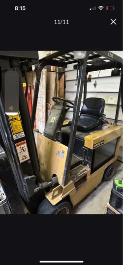 FORKLIFT With Extension Forks OBO Has New Batteries And Seat  With Charger And Breaker