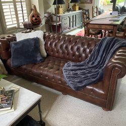 Beautiful Real Leather Chesterfield Couch. 6 Feet Long By 33 Inches Wide.
