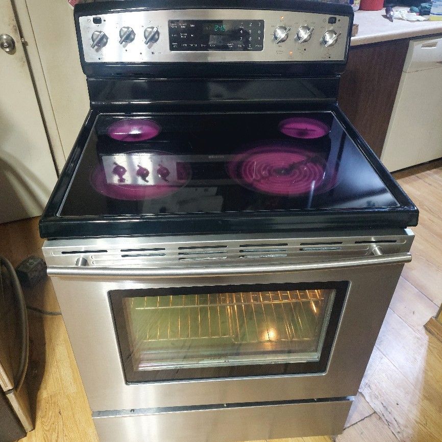 Jenn-Air 5 burner glasstop stove with warming drawer and self cleaning convection oven works perfect