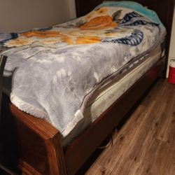 bed frame with a headboard and footboard.