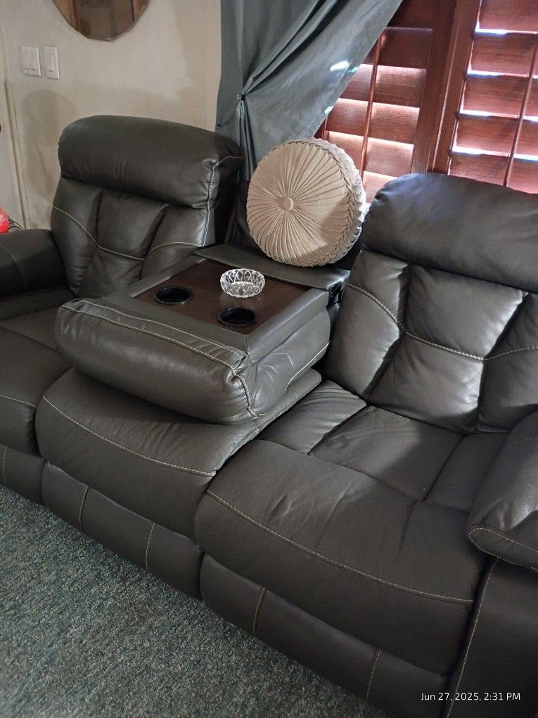 Green Leather. Reclining Couch..Both Ends Recline All The Way Back
