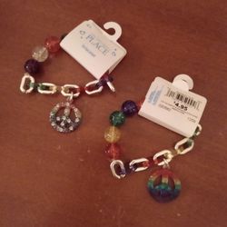 BRAND NEW IN PACKAGES WITH TAGS TODDLERS PEACE SIGN REVERSIBLE CHARM BRACELETS 