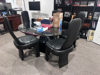 Round Glass Dining Table with 4 Black Chairs
