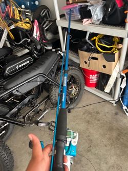 Fishing rod hardly used new line mono 20ib test