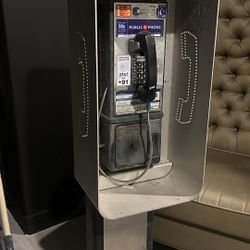 Vintage AT&T phone booth with working lights
