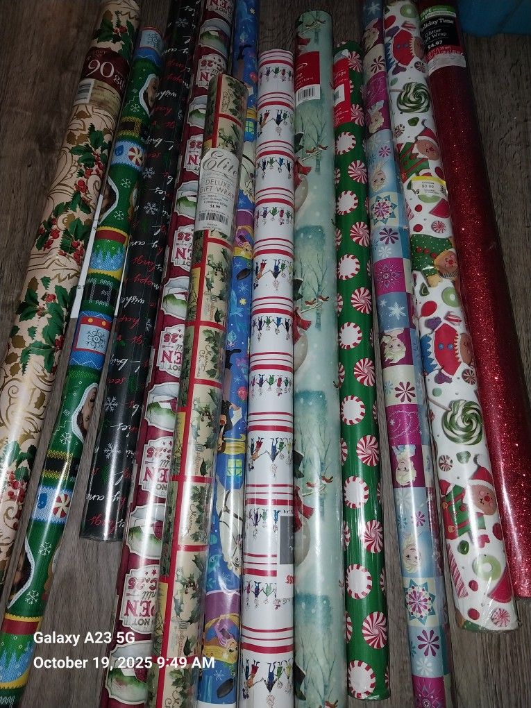 12 Rolls Of Wrapping Paper Still In Packaging 