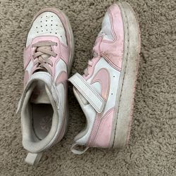 Pink and white Nike