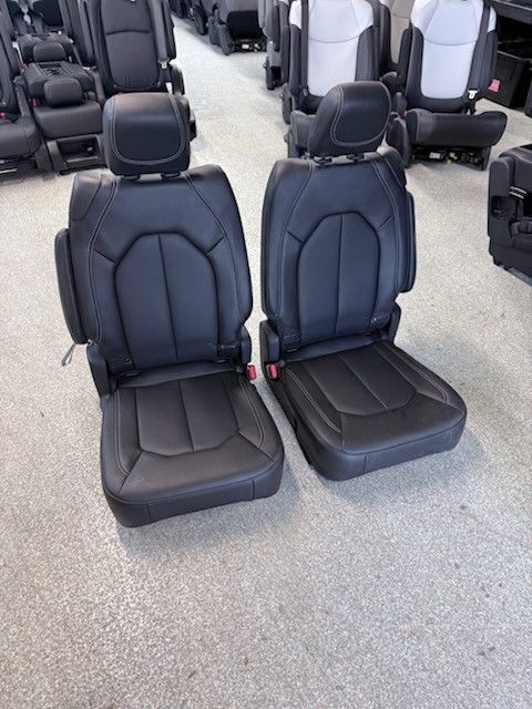 BRAND NEW BLACK LEATHER BUCKET SEATS 