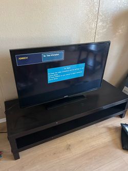 Samsung TV and TV stand