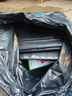 Bag filled with binders and dividers