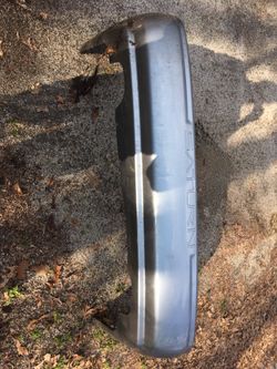 Saturn s series rear bumper cover. Light blue 2000-2002 sedan and wagon