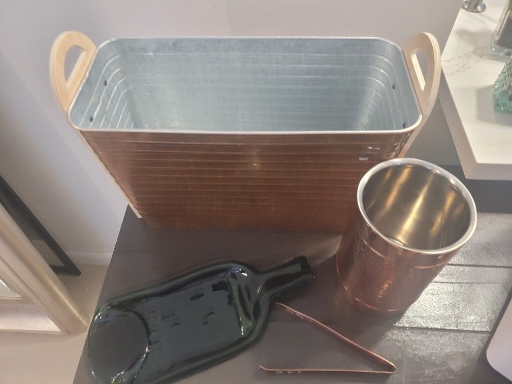 cooler, plus a beverage container and a glass bottle ornament.