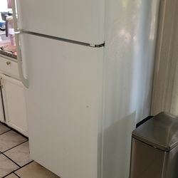 Frigidaire top freezer refrigerator.