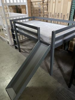 Twin slide bed. Available in grey & white. Assembly required. Assembly not included. Tax included. Free local delivery.  With out mattress-$299 With t