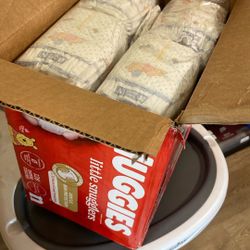 Newborn Diapers & High chair 